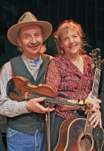 Photo of Jay Ungar with fiddle and Molly Mason with guitar