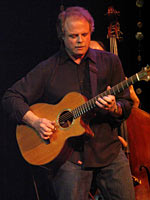 Photo of Pat Donohue with guitar