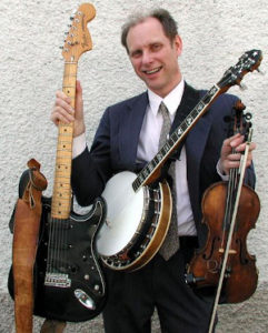 Photo of David Rimelis with instruments