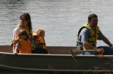 Photo of family in canoe