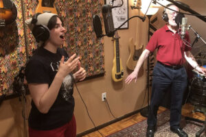 Photo of Sam Edelston with Teddy Parker